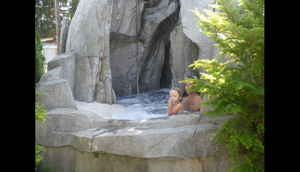 hot tub with climbing wall and rope