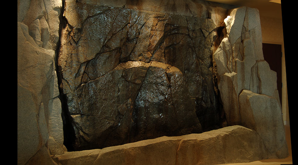 A custom rockwork indoor waterfall.