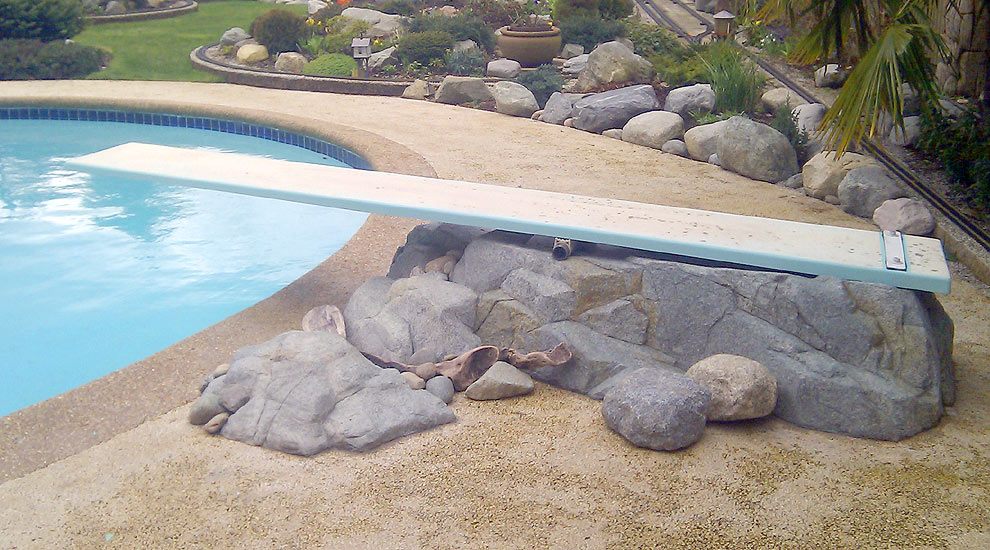 Delta: Retrofitting in rockwork to an older, traditional pool.