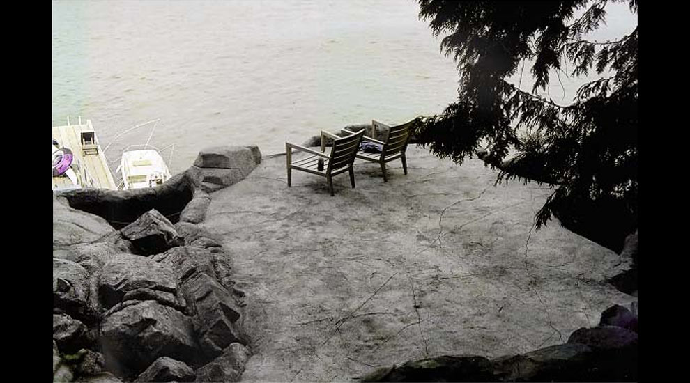 Artificial rock patio on top of the natural rock cliff.